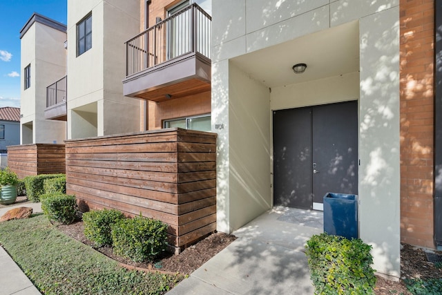 doorway to property with a balcony