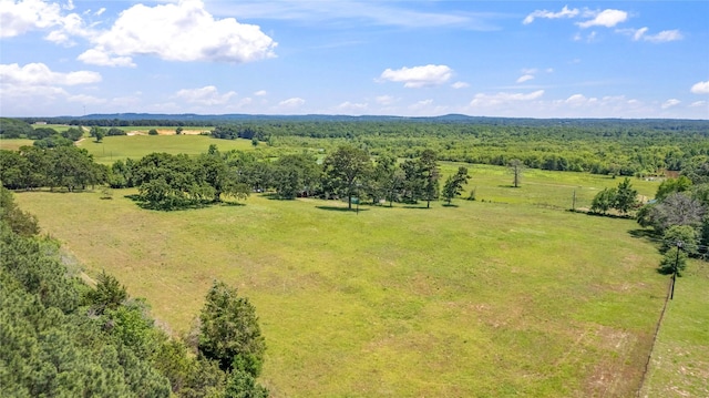 birds eye view of property with a rural view