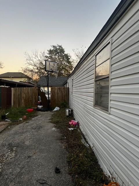 view of property exterior at dusk