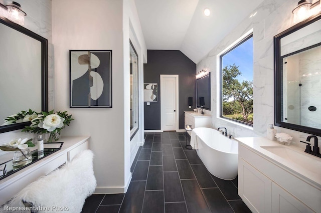 4121 Buffalo Clover Dr, Aubrey, TX 76227 - full bath with vaulted ceiling, a shower stall, a freestanding bath, and two vanities