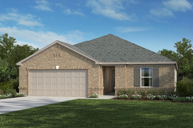 view of front of home with a front yard and a garage