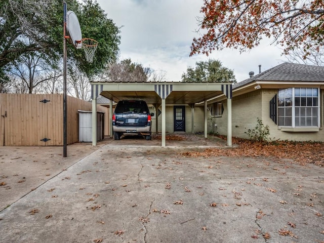 exterior space with a carport