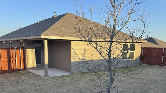 back of house with a patio area