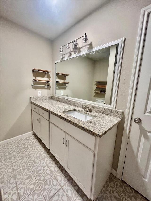 709 Kerry Ln, Azle, TX 76020 - bathroom with vanity and baseboards