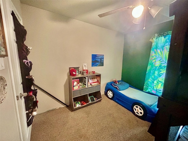 bedroom featuring carpet and ceiling fan