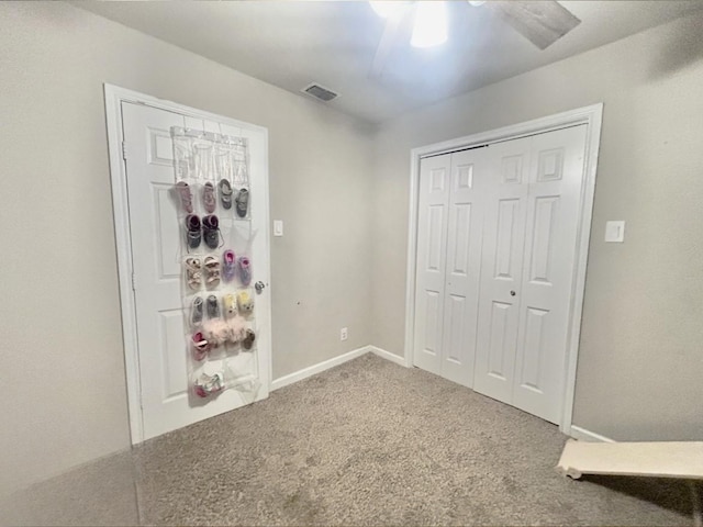 709 Kerry Ln, Azle, TX 76020 - unfurnished bedroom with carpet, ceiling fan, and a closet