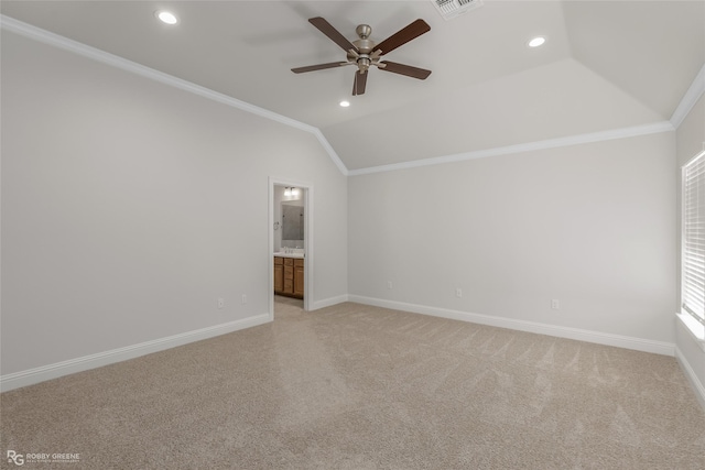 unfurnished room featuring vaulted ceiling, ceiling fan, and ornamental molding