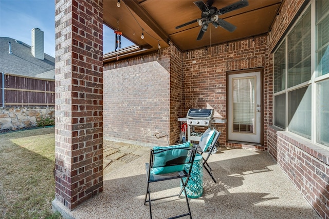 view of patio / terrace with area for grilling and ceiling fan