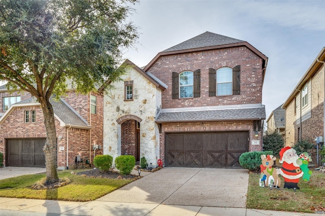 french country style house with a garage