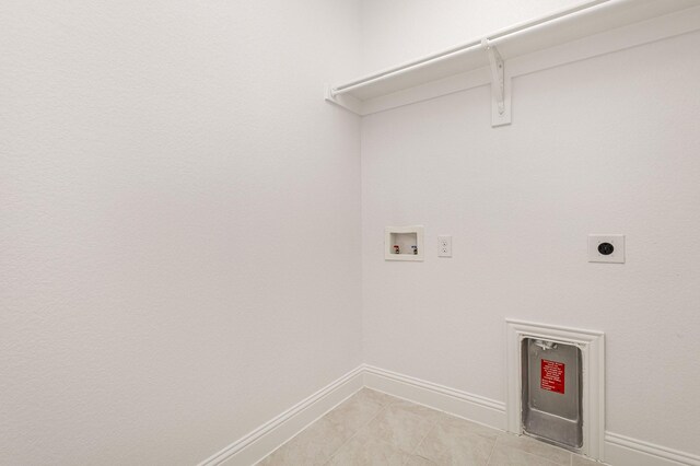 2013 Barx Dr, Little Elm, TX 75068 - washroom featuring washer hookup, hookup for an electric dryer, and light tile patterned floors