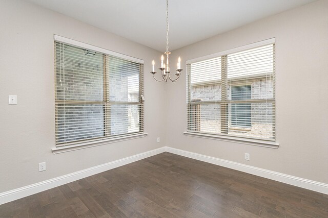 2013 Barx Dr, Little Elm, TX 75068 - empty room featuring a chandelier and dark wood-style floors