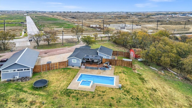 birds eye view of property with a rural view