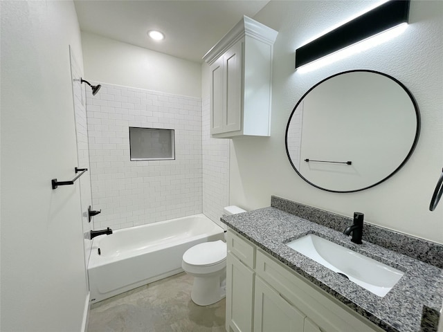 full bathroom featuring vanity, toilet, and tiled shower / bath