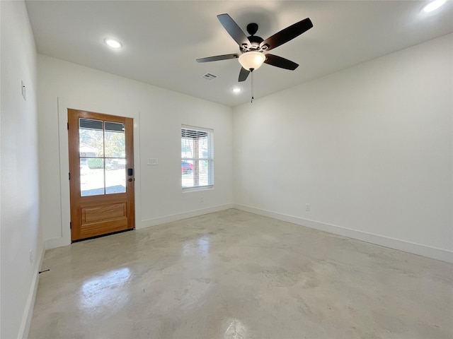 unfurnished room featuring ceiling fan