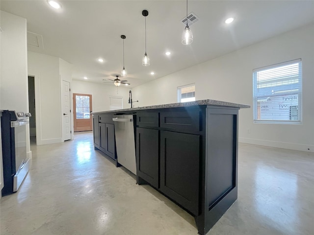 kitchen featuring ceiling fan, dishwasher, an island with sink, and range