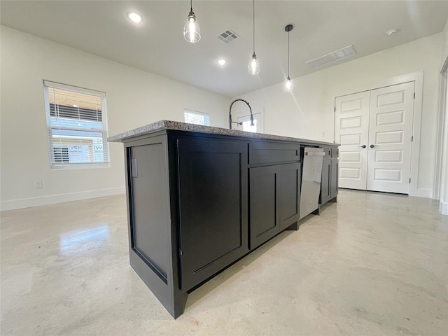 kitchen with light stone countertops, stainless steel dishwasher, sink, pendant lighting, and a center island with sink