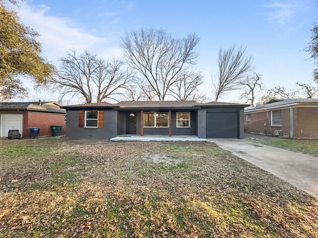 back of property featuring a yard