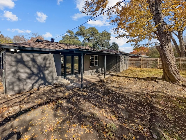 rear view of house featuring a patio area