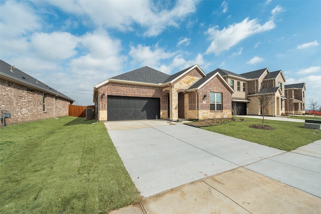 view of front of home featuring a garage, central AC unit, and a front lawn