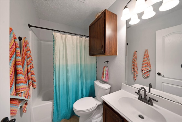 full bathroom featuring vanity, shower / tub combo, a textured ceiling, and toilet