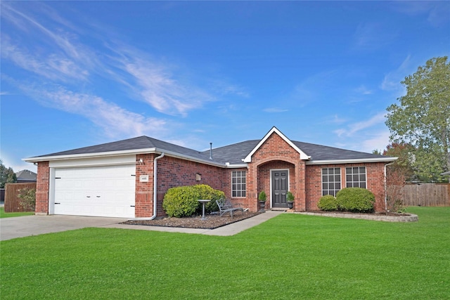 ranch-style house featuring a garage and a front yard