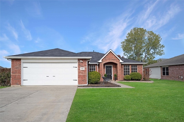 single story home featuring a front yard and a garage