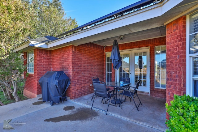 view of patio featuring a grill and french doors