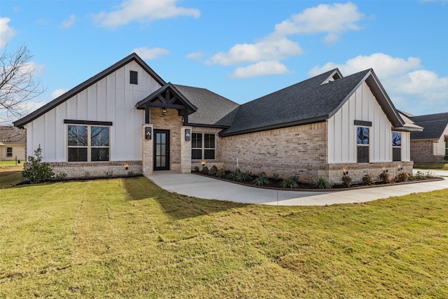 modern farmhouse with a front lawn