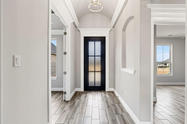 foyer entrance with vaulted ceiling