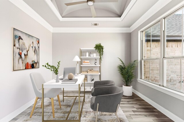 office space featuring crown molding, hardwood / wood-style floors, ceiling fan, and vaulted ceiling