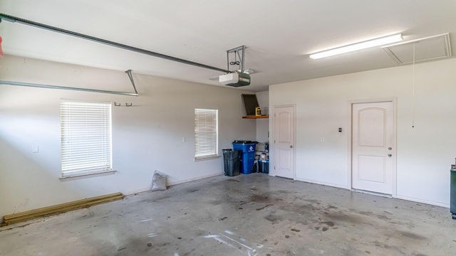 garage featuring a garage door opener