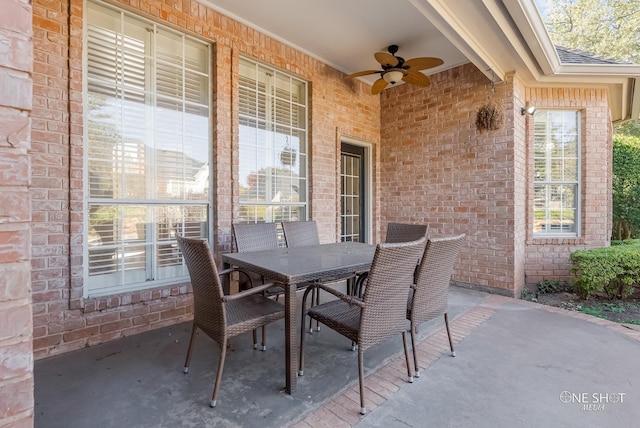 view of patio featuring ceiling fan