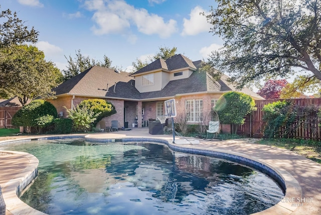 view of pool with a patio