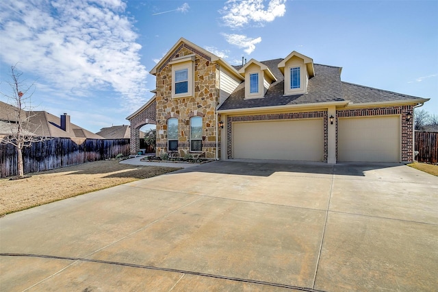 view of front of home featuring a garage