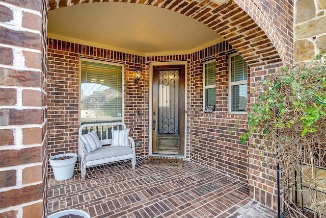 doorway to property with covered porch