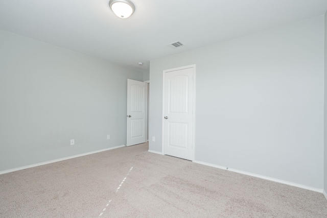 empty room with light carpet