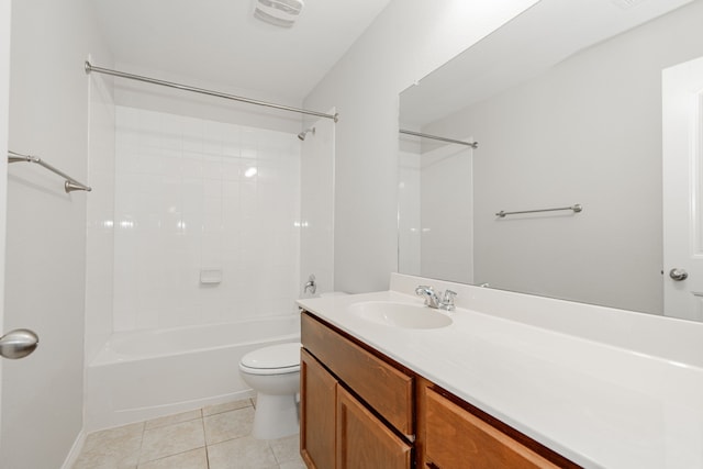 full bathroom with tile patterned flooring, vanity, toilet, and tiled shower / bath