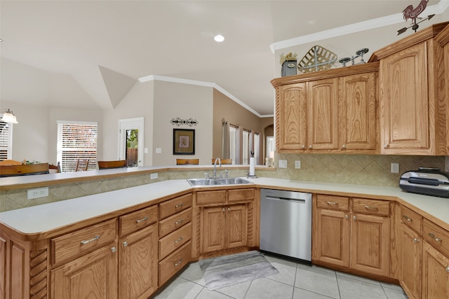 kitchen with kitchen peninsula, decorative backsplash, sink, light tile patterned floors, and dishwasher