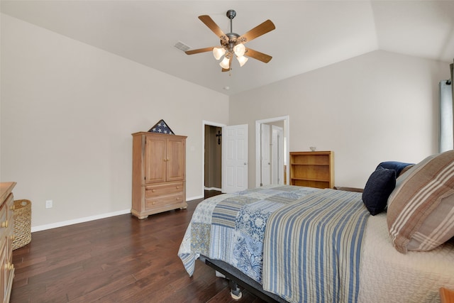 bedroom featuring dark hardwood / wood-style flooring, ceiling fan, and lofted ceiling