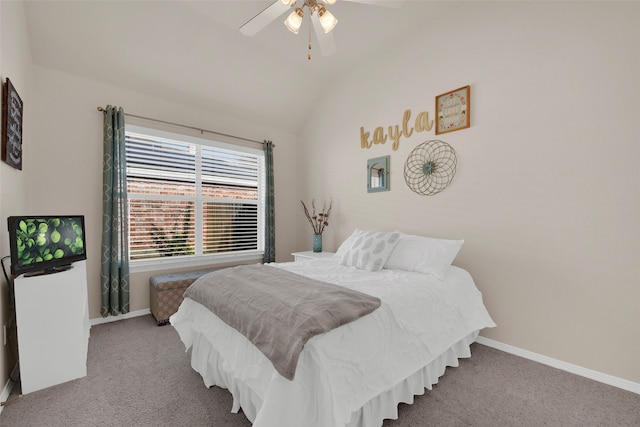 bedroom featuring ceiling fan, light colored carpet, and lofted ceiling