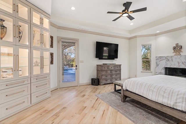 bedroom with access to outside, light hardwood / wood-style flooring, ceiling fan, and ornamental molding