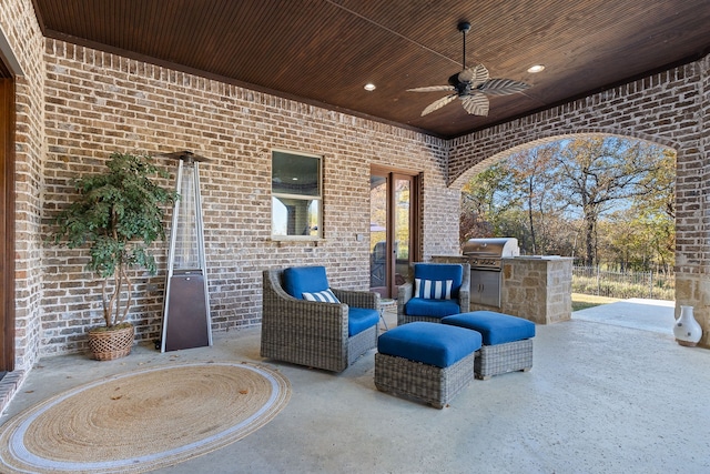 view of patio featuring ceiling fan and area for grilling