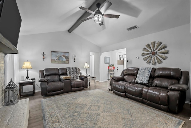 living room featuring ceiling fan, lofted ceiling with beams, and dark hardwood / wood-style flooring