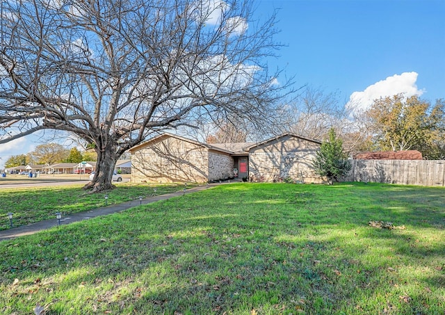 exterior space with a front yard