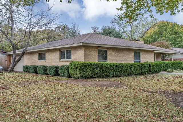 view of property exterior featuring a yard