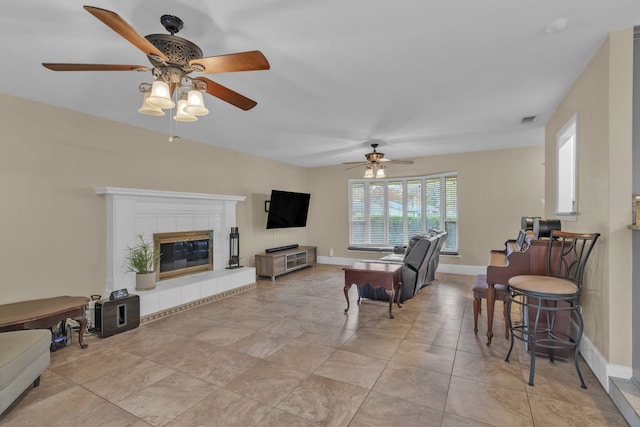 tiled living room with a fireplace