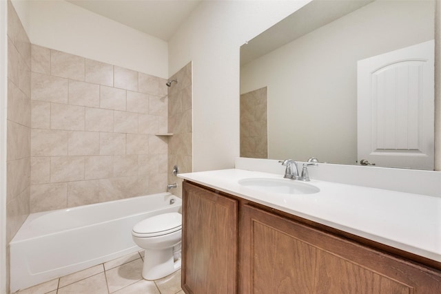 full bathroom featuring tile patterned flooring, vanity, tiled shower / bath combo, and toilet