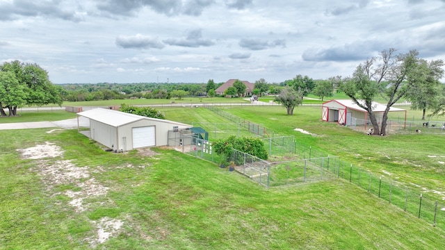 birds eye view of property with a rural view