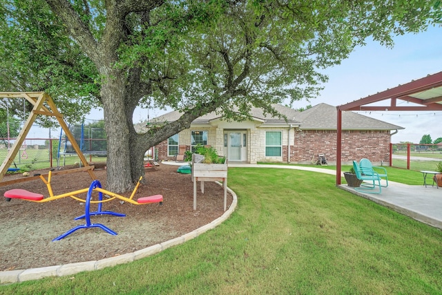 exterior space featuring a patio and a playground