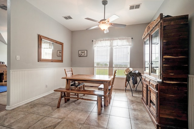 dining area with ceiling fan and light tile patterned floors